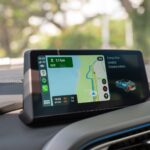 black android smartphone on car dashboard